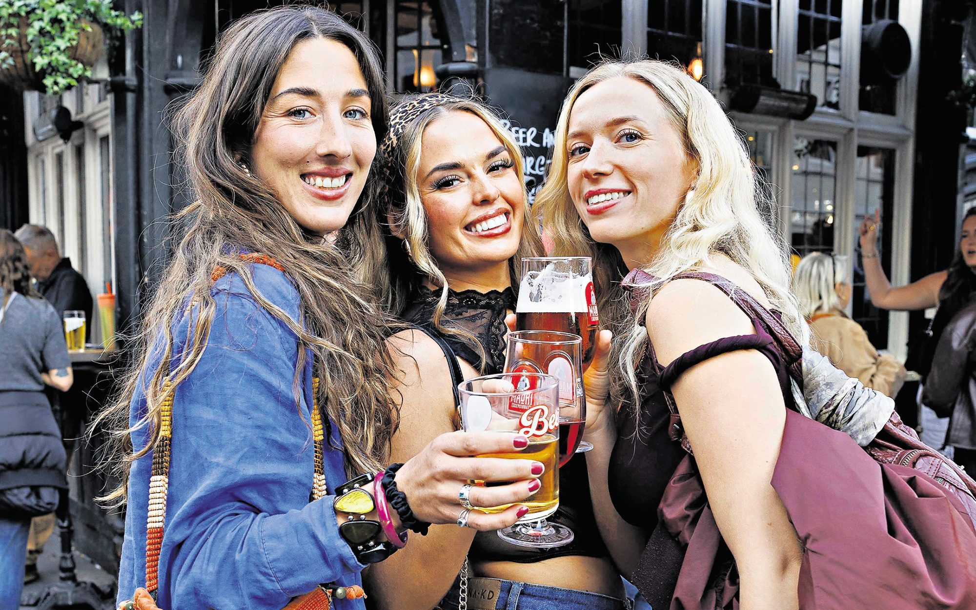 Bank holiday drinkers enjoying pints of beer in Soho - Belinda Jiao for The Telegraph