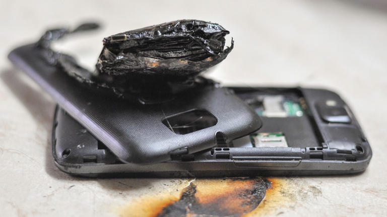 The danger with trying to retrieve a phone that falls between plane seats