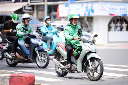 Cuộc đua của app gọi xe ngày càng nóng - Ảnh: QUANG ĐỊNH