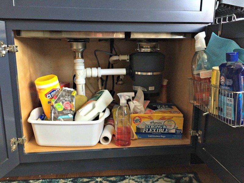 She transformed her messy kitchen cabinet into a clean, organized space