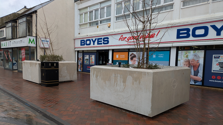 The planters also include seating and are part of a series of high street improvements