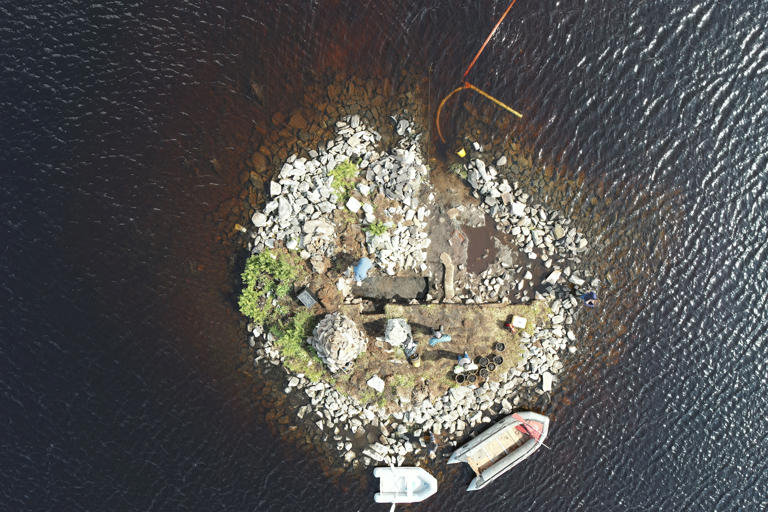 Wooden platform found hidden under Neolithic artificial island in loch