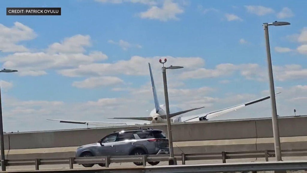 United flight landing at Newark Liberty Airport strikes light pole on ...