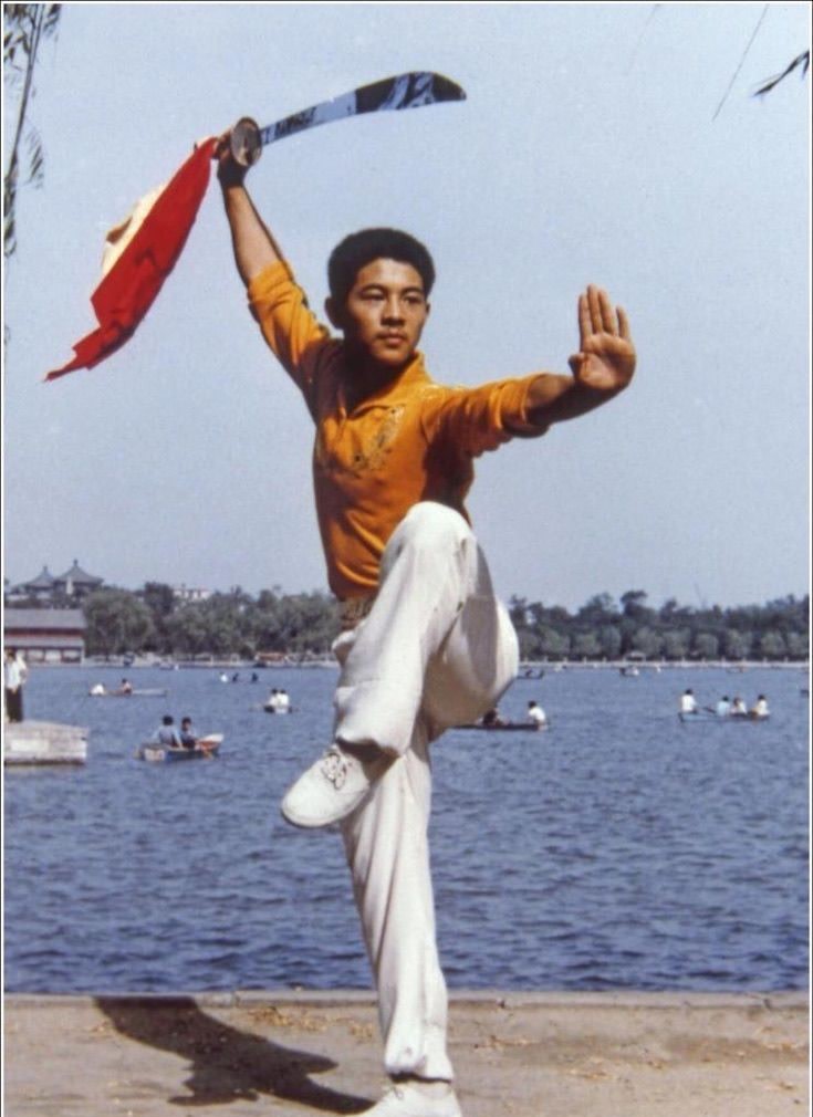 Jet Li exercises with tai chi and ping-pong