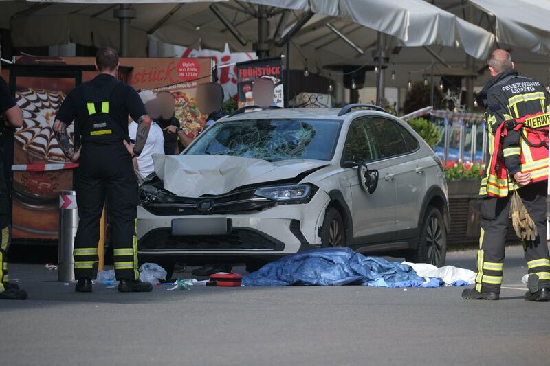 At least one dead and several injured after car rams into crowd in ...
