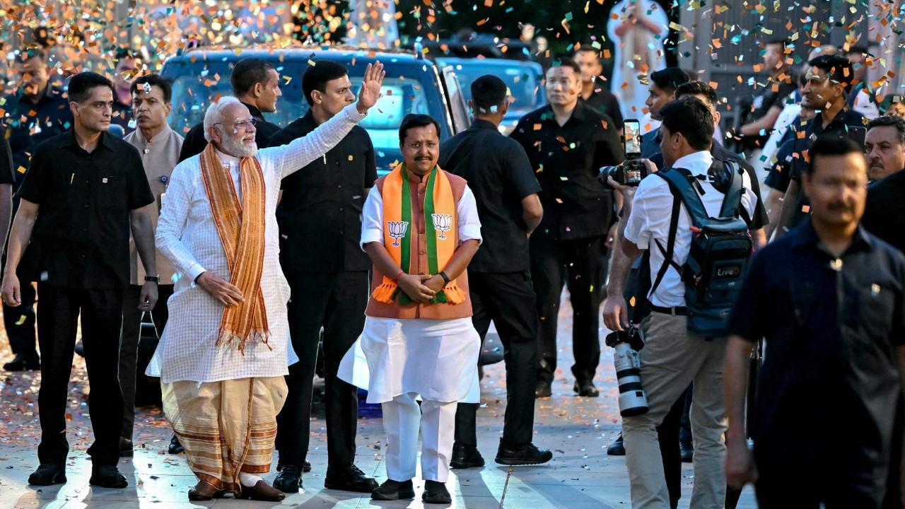 IN PHOTOS PM Modi wears Bengalistyle attire during his visit to BJP HQ