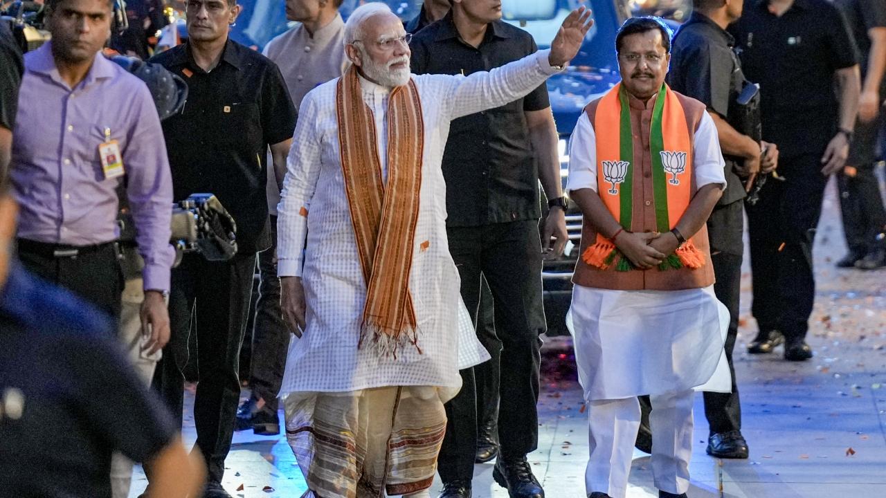 IN PHOTOS PM Modi wears Bengalistyle attire during his visit to BJP HQ