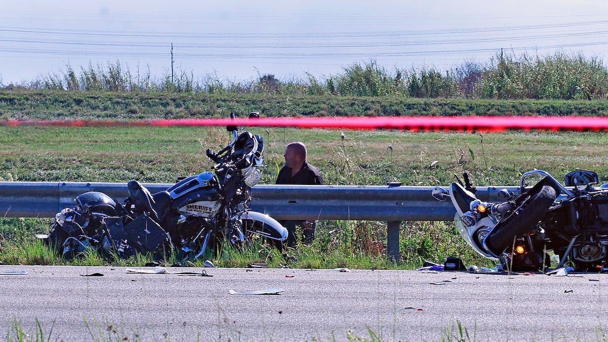 The scene along Southern Boulevard in Palm Beach County where a crash claimed the lives of three deputies. ©Mike Stocker