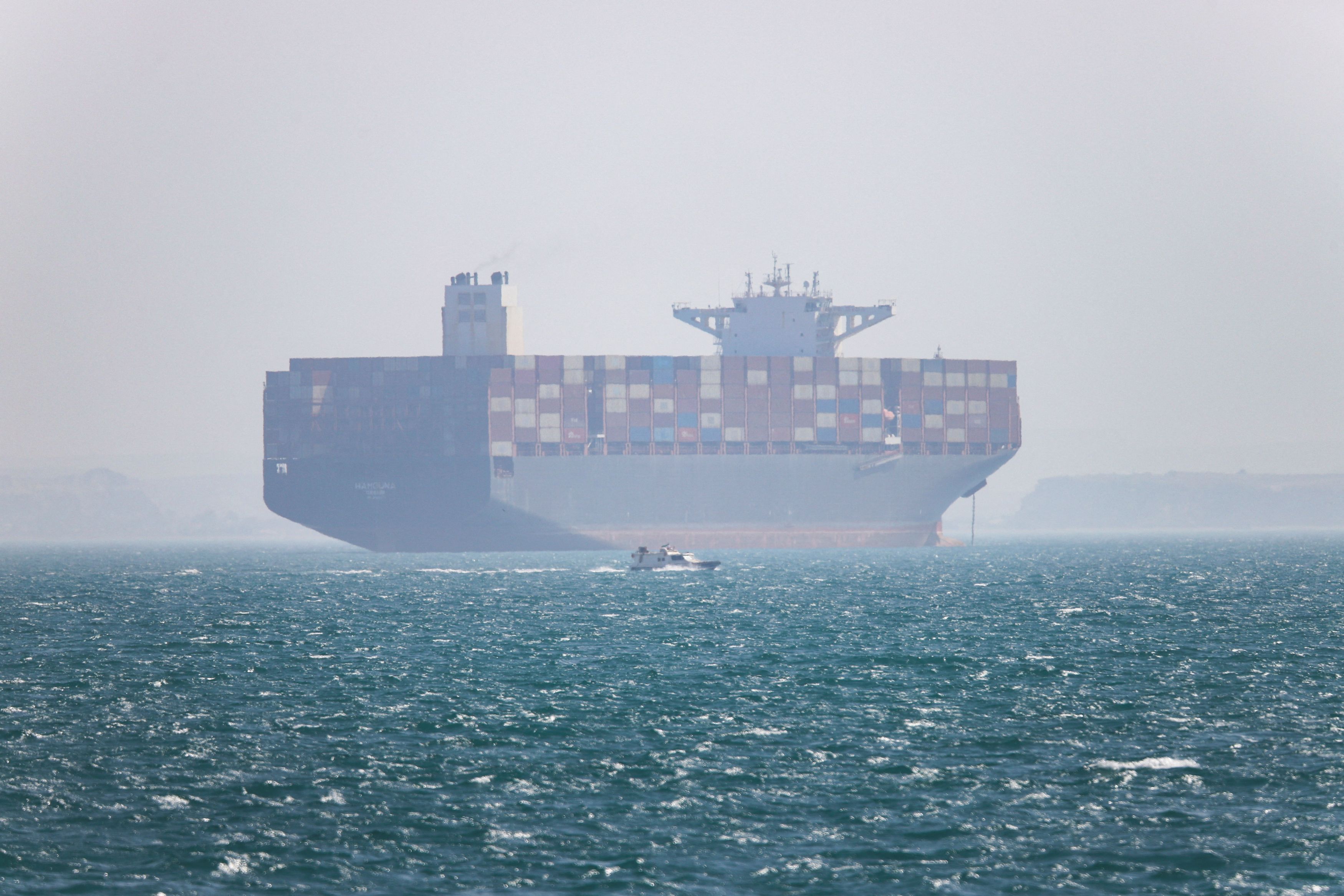 U.S. destroyers, merchant ships pass through Strait of Hormuz