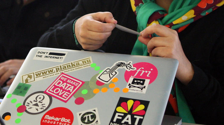 You should never put stickers on this part of your laptop