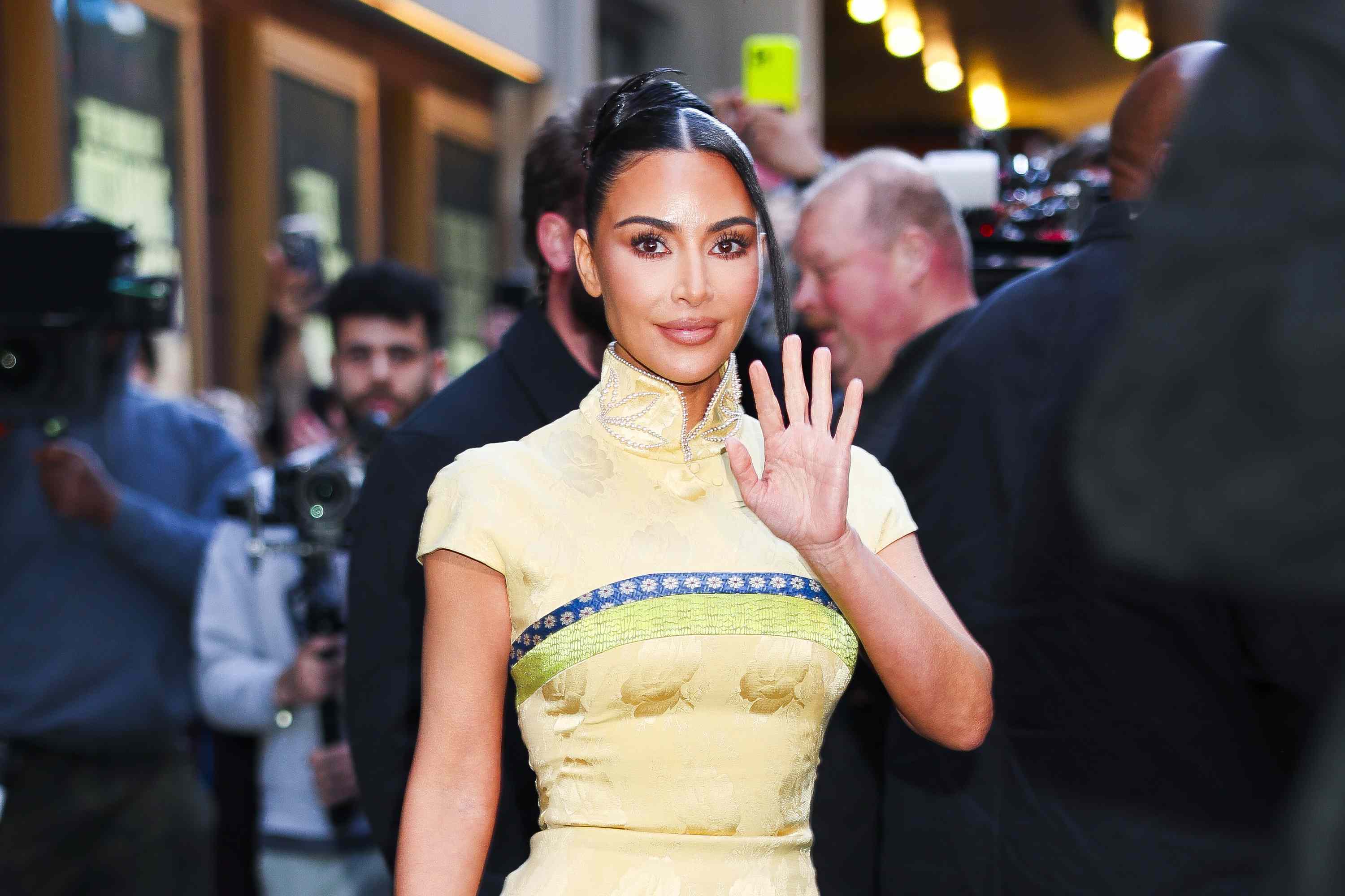 Kim Kardashian accents her high-slit vintage Dior gown with a $100,000 rare  Birkin and polarizing shoes
