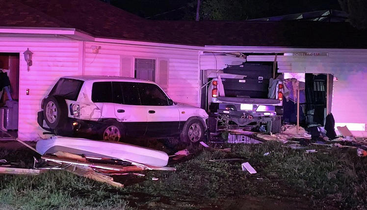 Woman injured after suspected drunk driver crashes into home