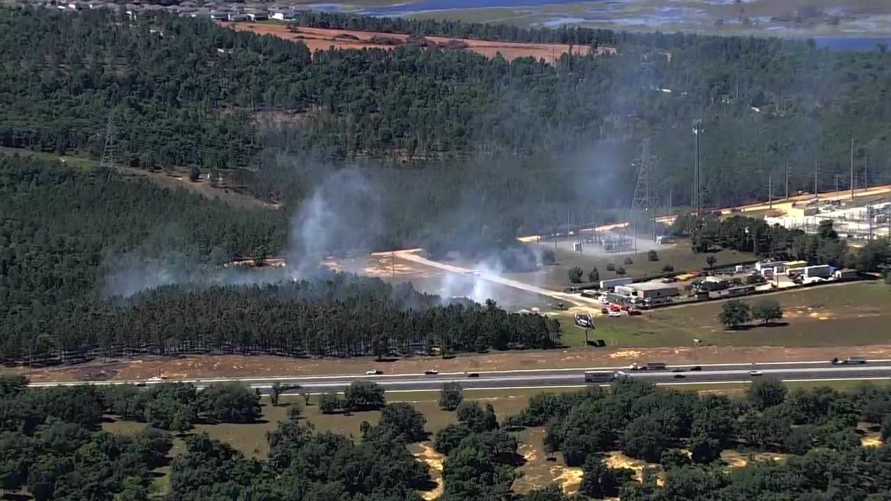 Car ignites brush fire near Florida's Turnpike in Lake County