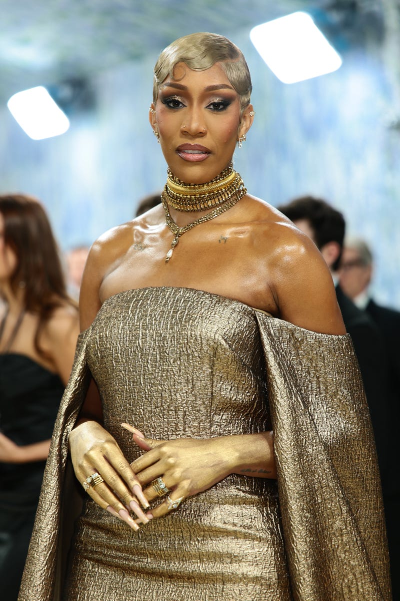 A'ja Wilson's slicked-down gold hair matched her gown at the Met Gala
