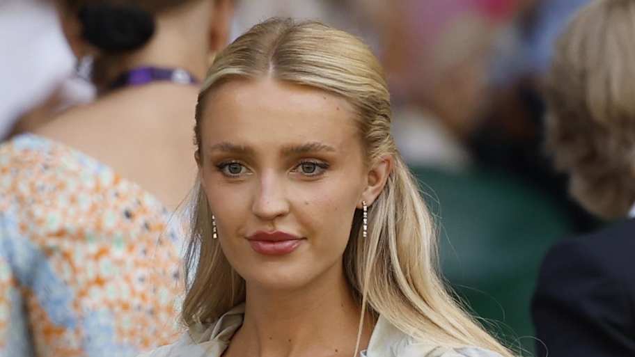 Morgan Riddle masks 'heartbreak' in all-pink workout fit after Taylor ...