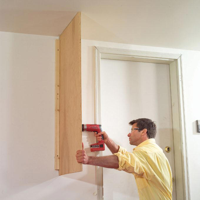 How to build and install garage cabinets with sliding doors