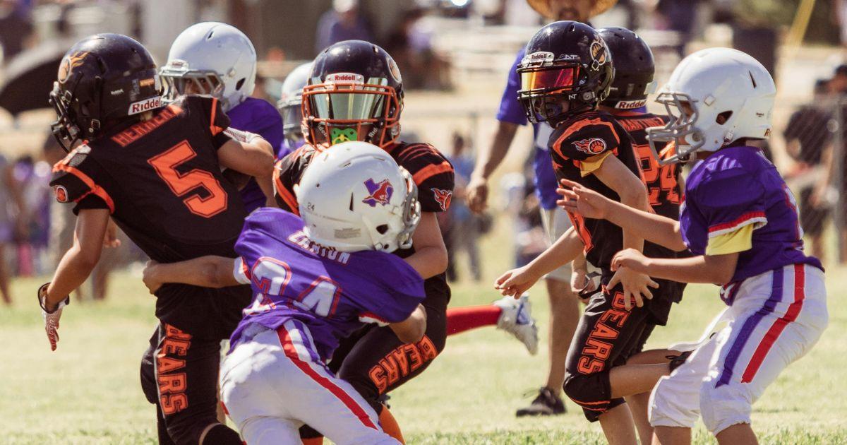 Florida mom charged after allegedly kicking child during Pop Warner ...