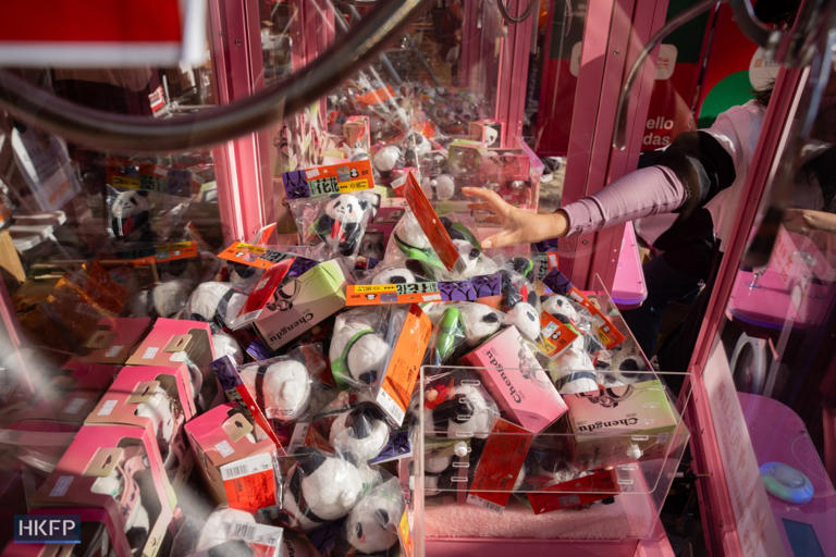 A claw machine loaded with panda toys in Tsim Sha Tsui, Hong Kong, December 11, 2024. Photo: Kyle Lam/HKFP.