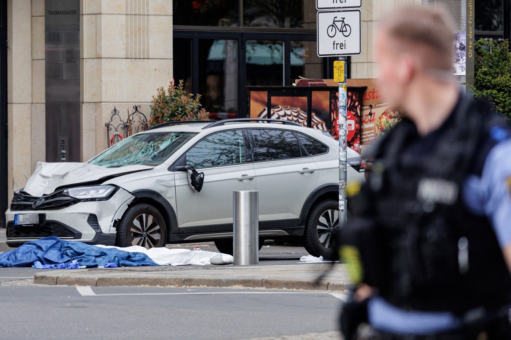 Two dead and at least 20 injured after car ploughs into crowd in Leipzig