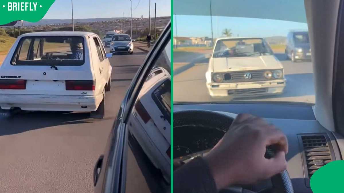 South African man overtakes a car while driving in full reverse on a ...