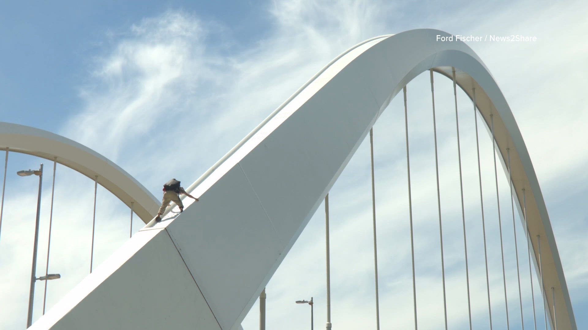 Protester remains on Frederick Douglass Bridge Tuesday