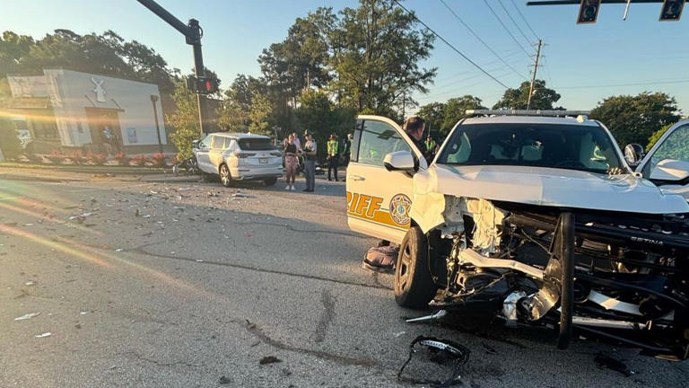 Deputy hit after driver runs red light, police say