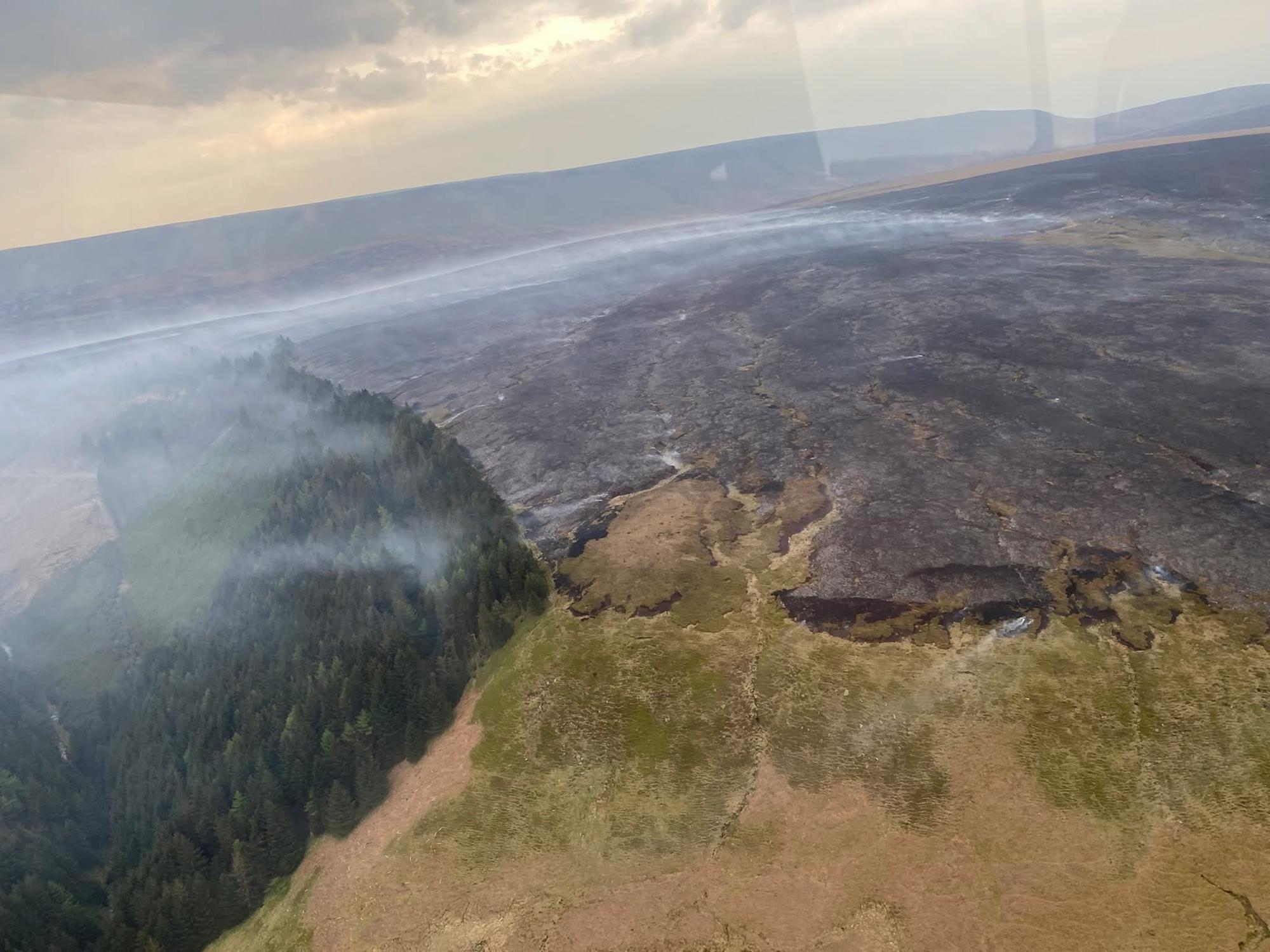 Fire crews leave scene of Peak District wildfire after remaining in ...