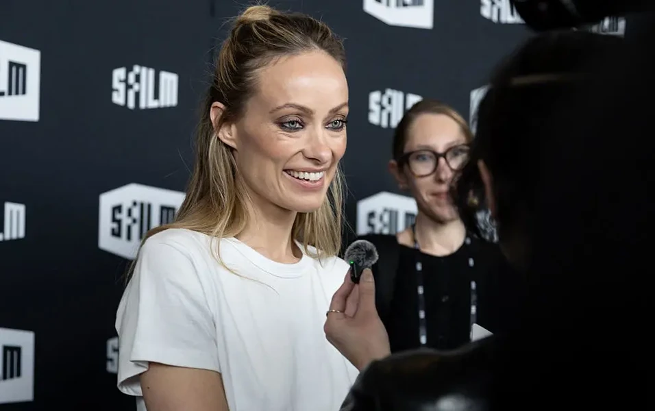 Olivia Wilde blames camera lens for viral red carpet look