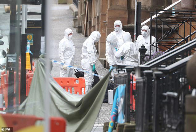 Asylum seeker shot dead after stabbing six people in hotel 'wanted to ...