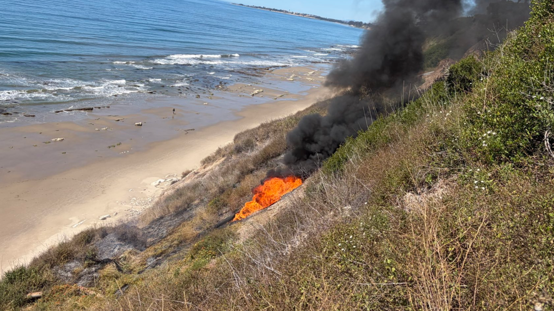 Smoke rising from 'volcano' at California beach sparks rare geological ...