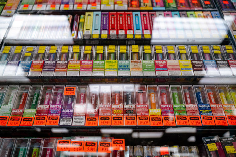 After Trump pressure, FDA chief OKs some flavored vapes