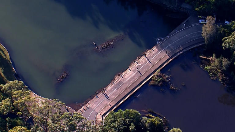 The body was recovered following a multi-agency search for a male passenger whose car submerged in water. (ABC News)