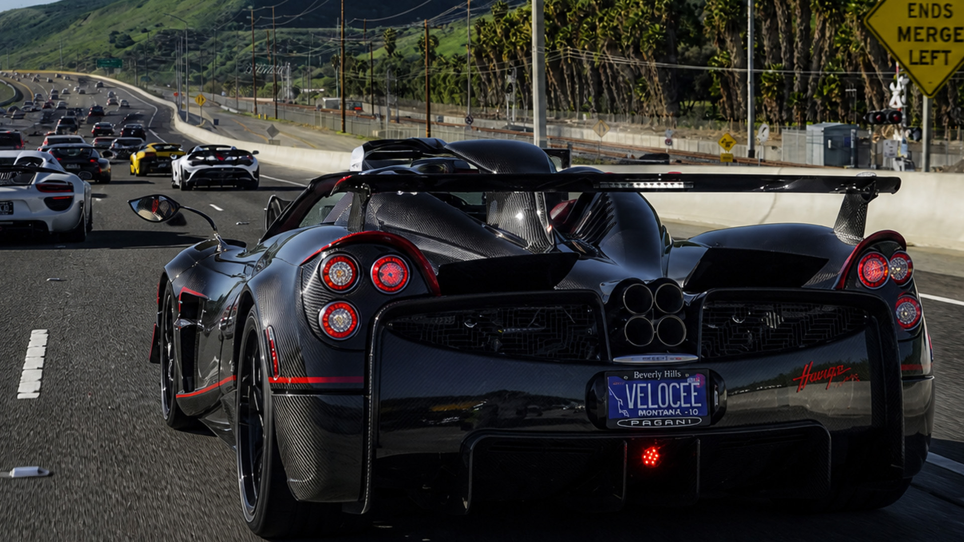 Pagani Huayra roadster convoy cruising on California highway