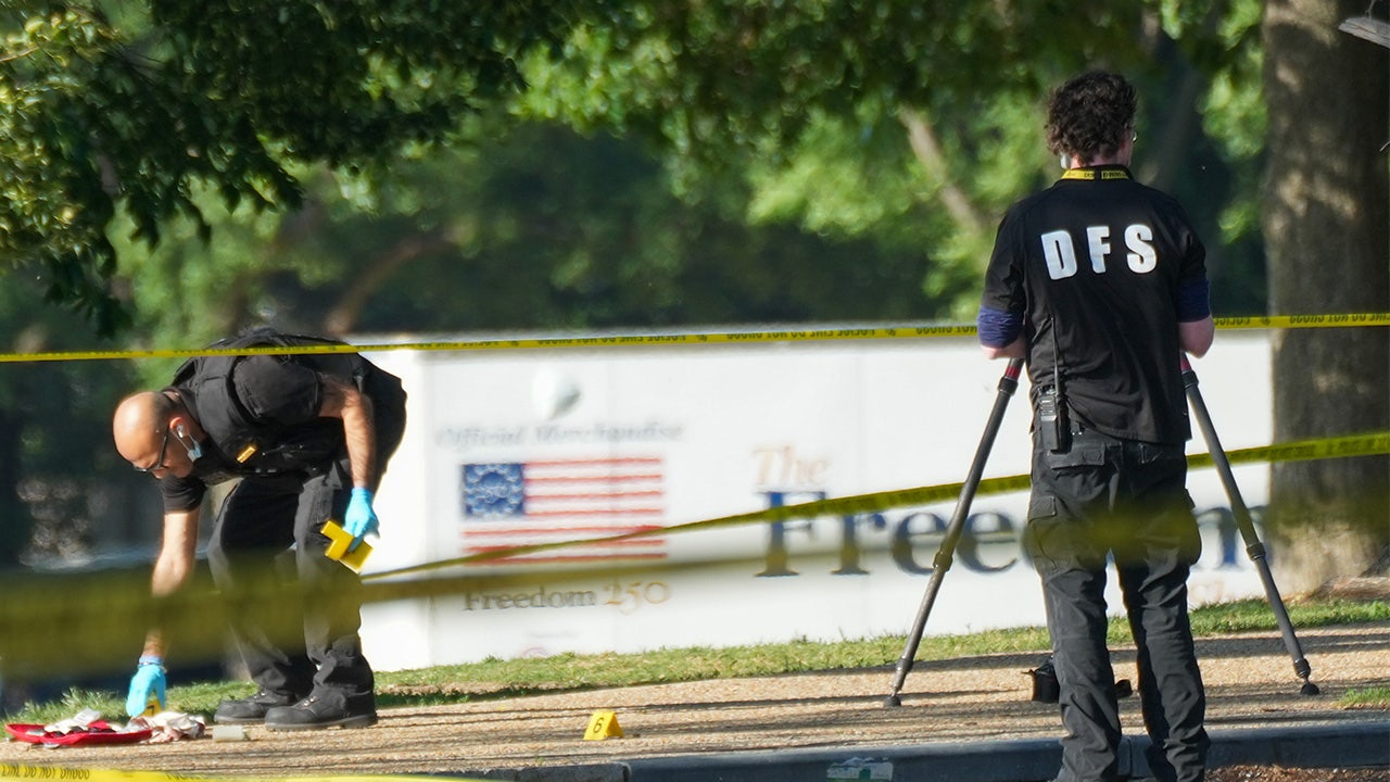 Crime scene technicians catalog evidence following an exchange of gunfire by the U.S. Secret Service and a gunman on the National Mall on May 4, 2026, in Washington, D.C.