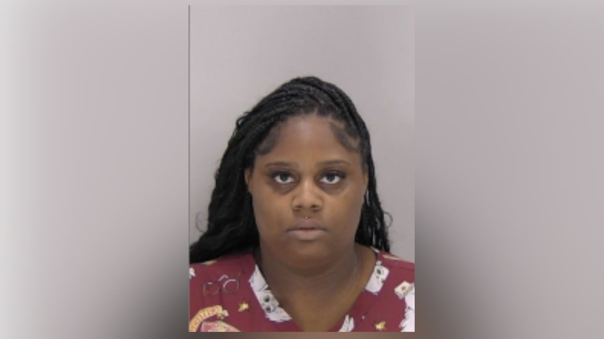 Woman accused of pinning child down, putting foot on his face at ...