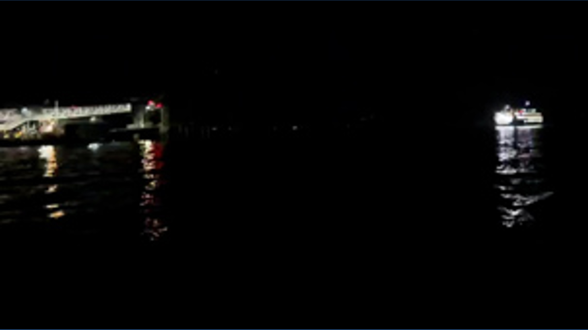 Edmonds ferry heads to dock at night