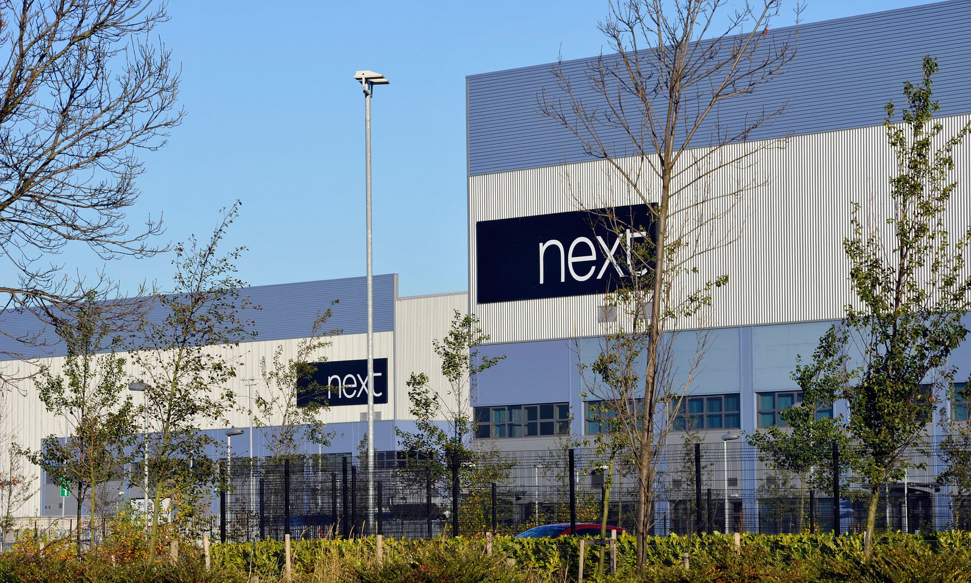 UK shoppers will dodge the worst of price rises, says Next, as it ...