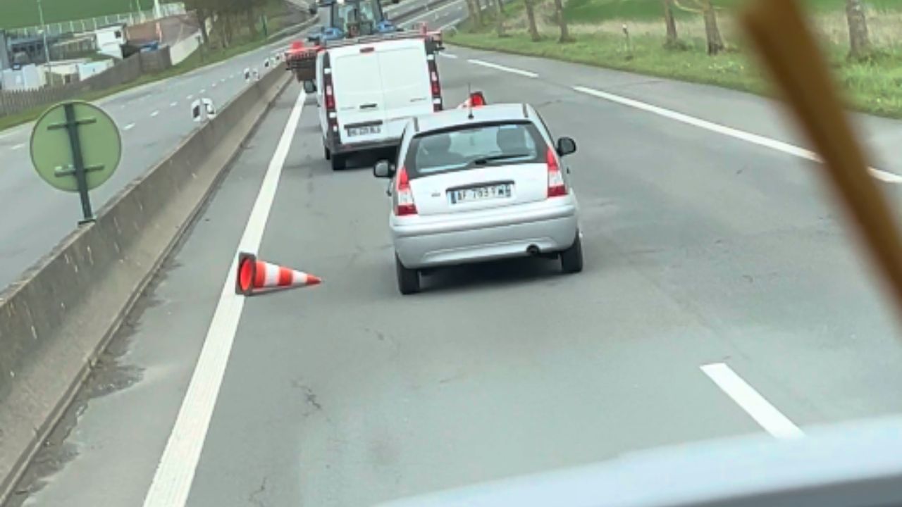 Truck obliterates road cones in its path