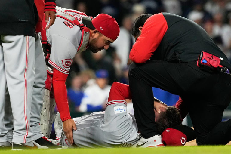 Reds closer Emilio Pagán carted off with an apparent left hamstring ...