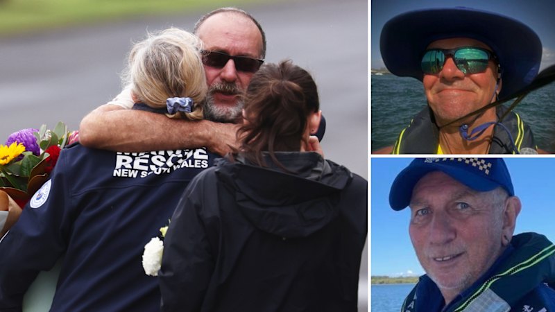 Ballina locals pay their respects outside the Marine Rescue Centre in Ballina after two rescuers - Frank Petsch, 62, and Bill Ewen, 78, died while trying to save a stricken yachtsman.