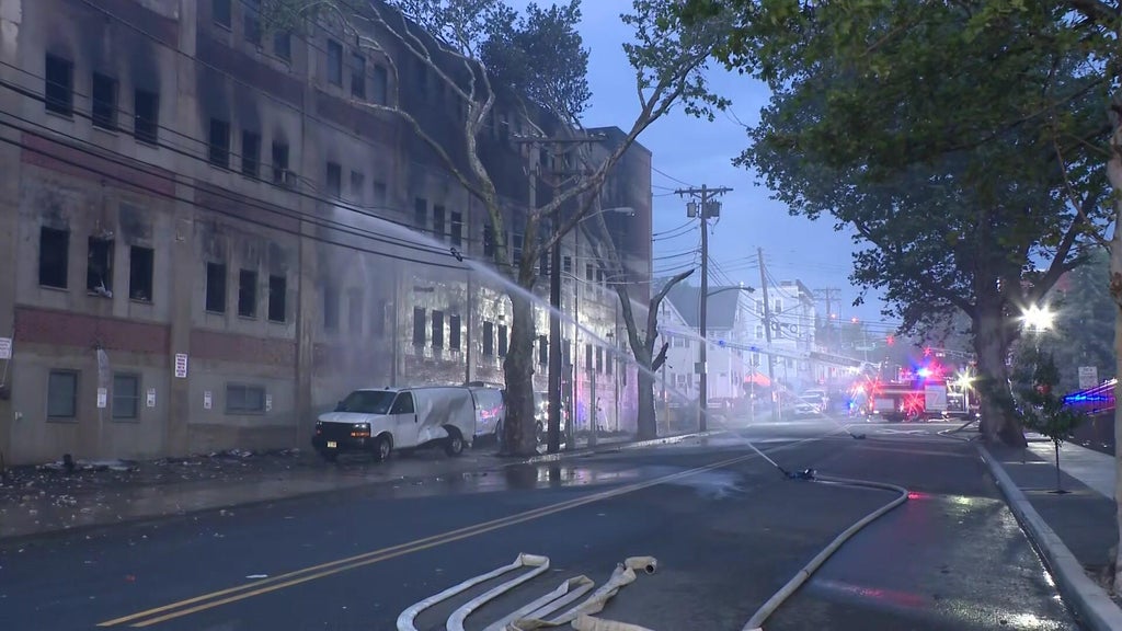 Hot spots still burn days after warehouse fire in Belleville, NJ scorches several buildings