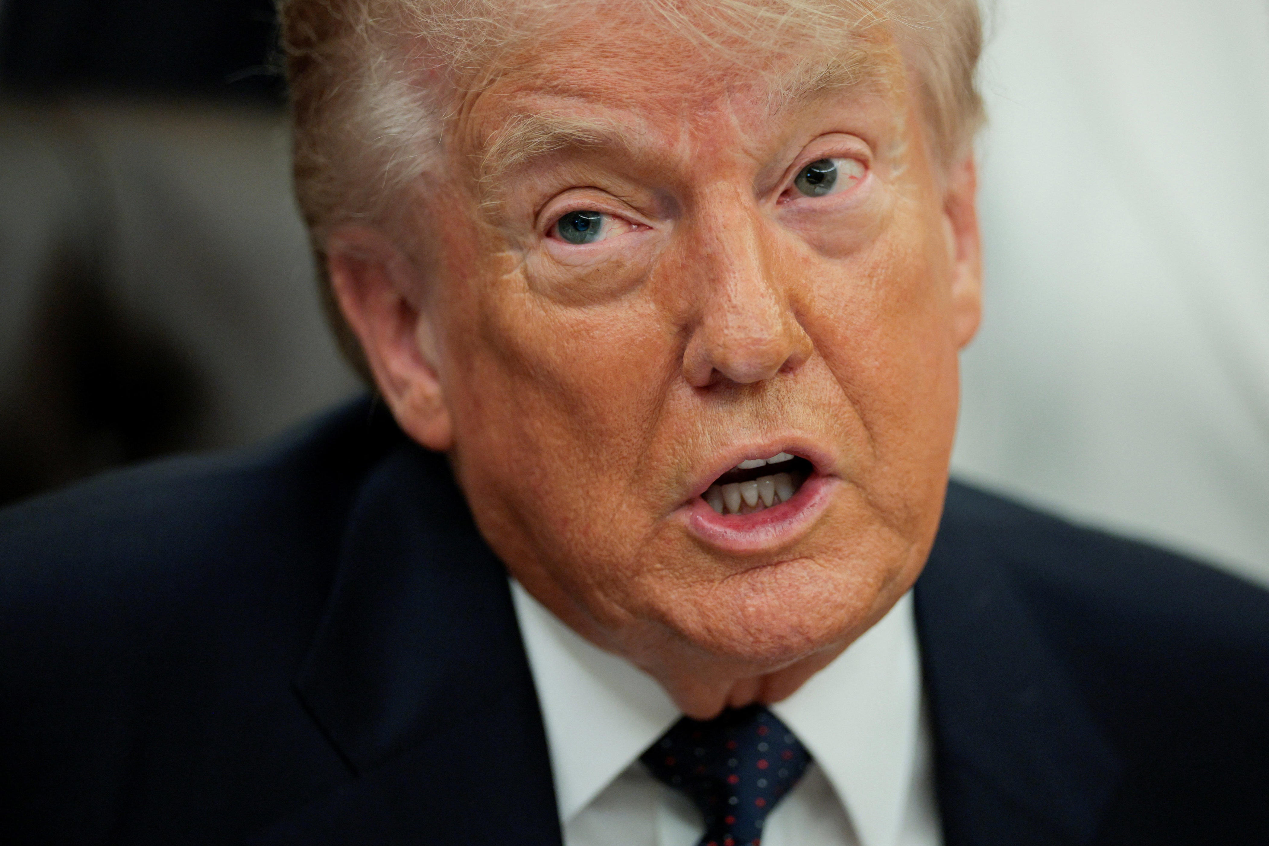 U.S. President Donald Trump speaks during an event to sign a memorandum in the Oval Office at the White House in Washington, D.C., on May 5, 2026.