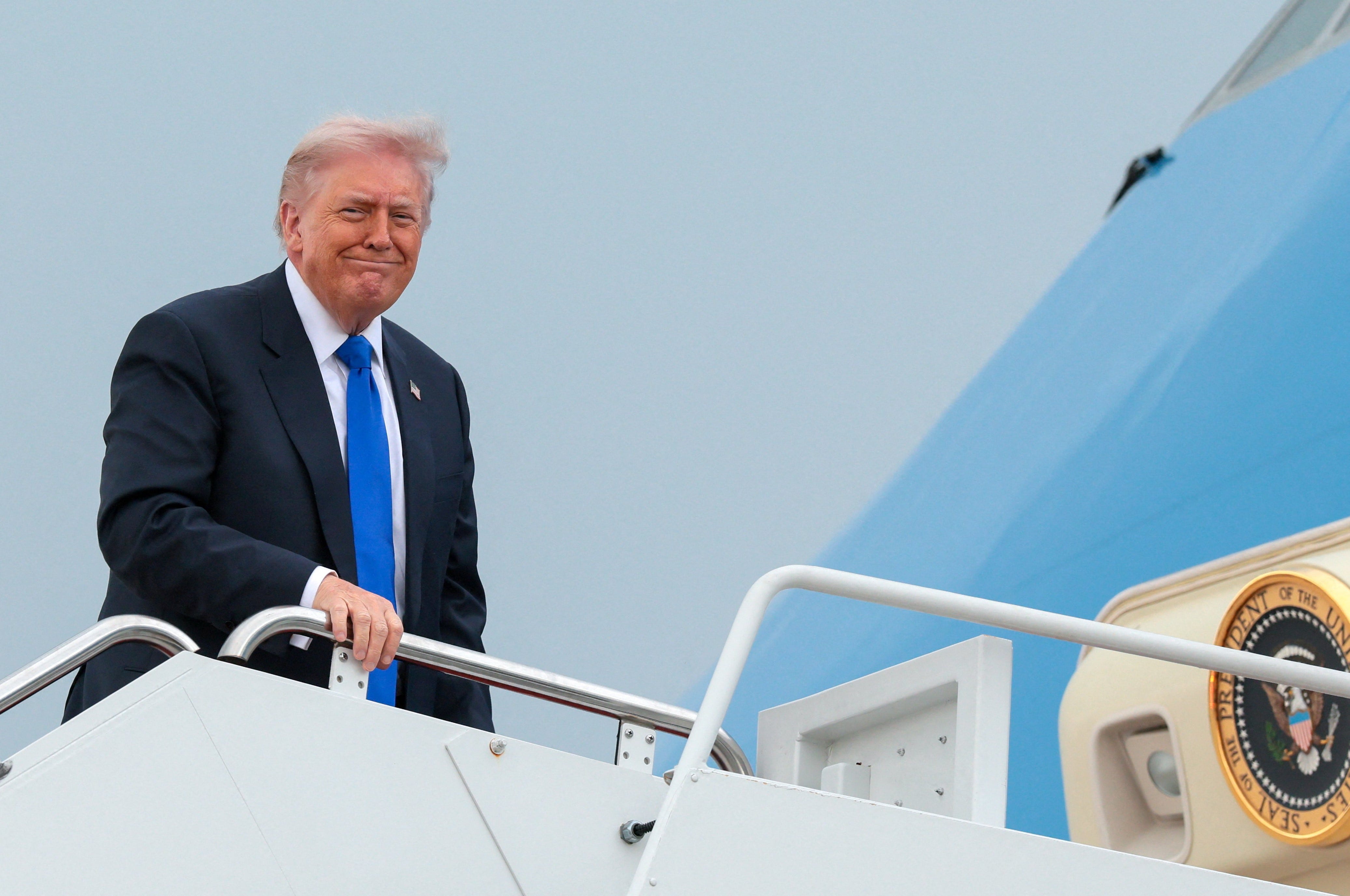U.S. President Donald Trump boards Air Force One en route to Palm Beach International Airport, at Joint Base Andrews, Maryland on April 24, 2026.