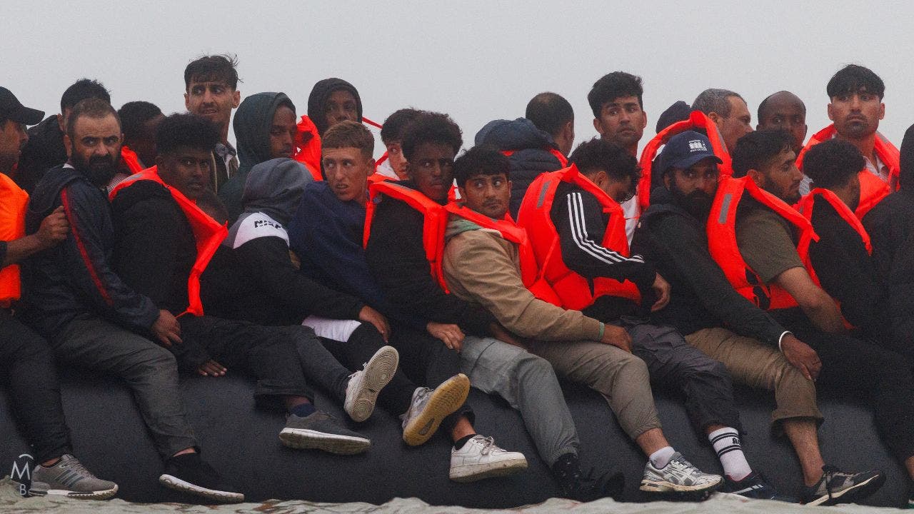 A small boat carrying migrants heads into the English Channel near Gravelines, France, on July 2, 2025. The boat was full of migrants who boarded further down the coast.