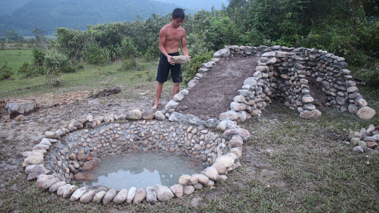 Underground water slide & stone swimming pool construction
