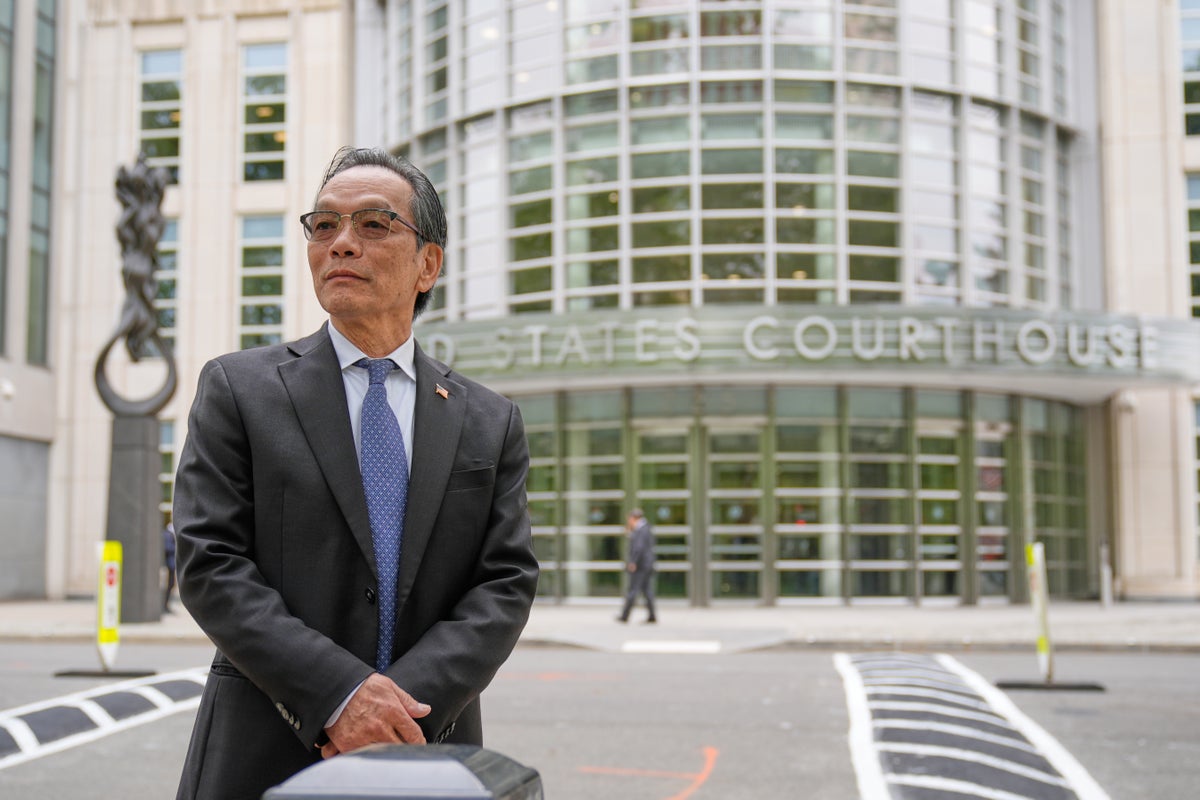 He's accused of running a Chinese spy outpost. His lawyer says it was a ...