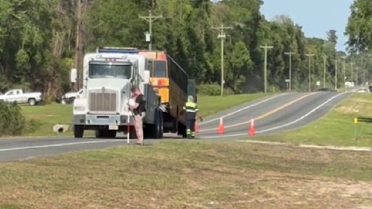 Pickup truck driver dies after school bus crash with students on board