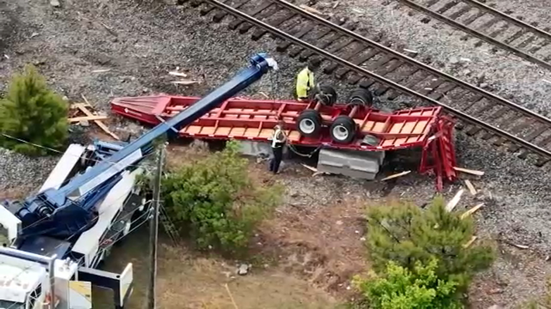 6 hurt after collision between trailer, Amtrak train in Cary