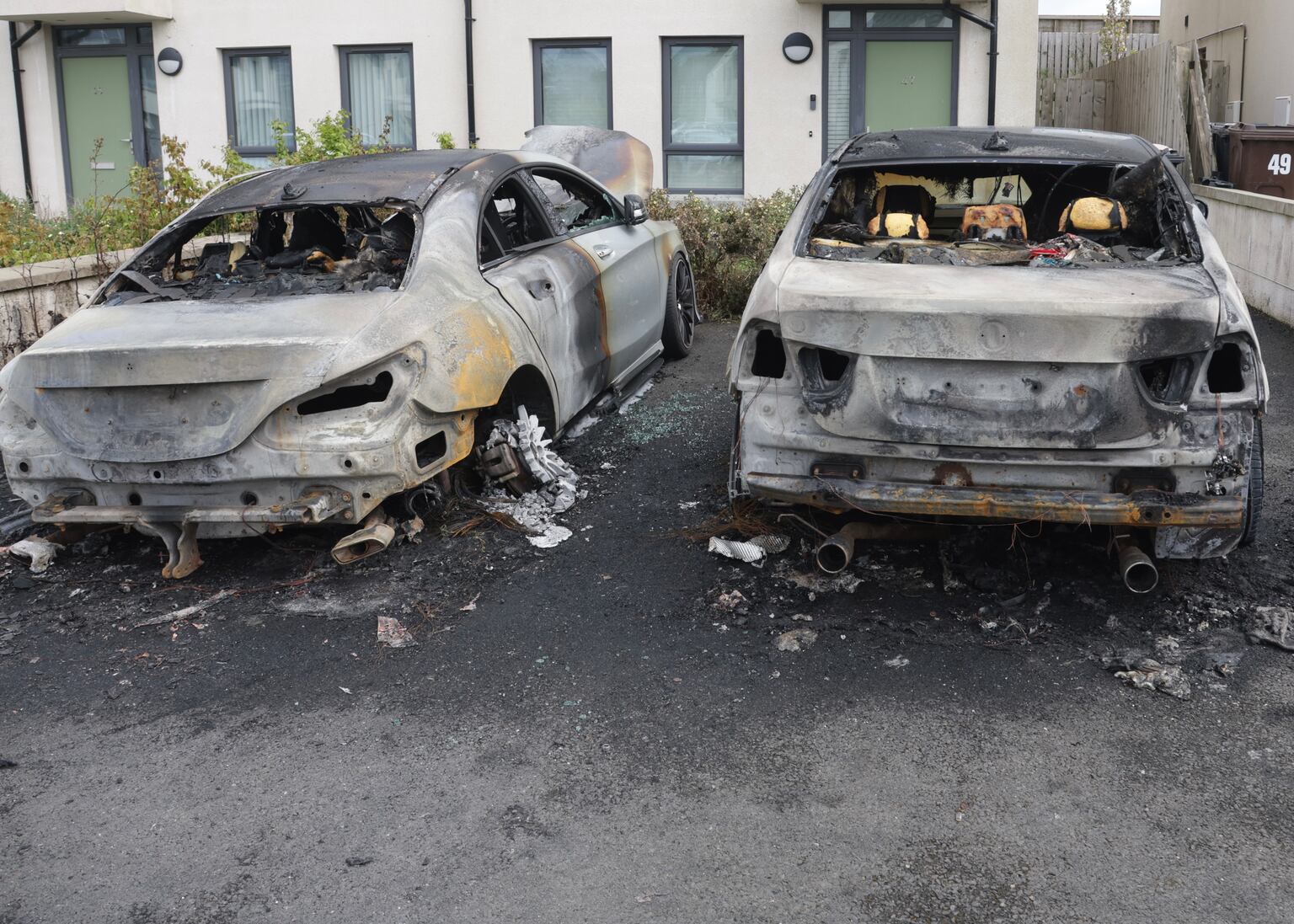 Mum says neighbour’s screams saved her and son as cars torched in arson ...