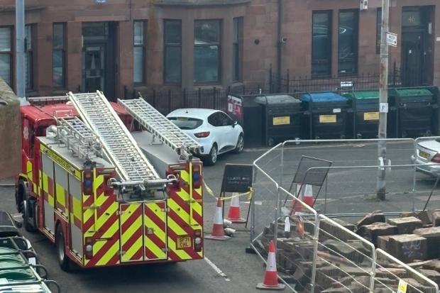 Two rushed to hospital after fire tears through top-floor flat in ...